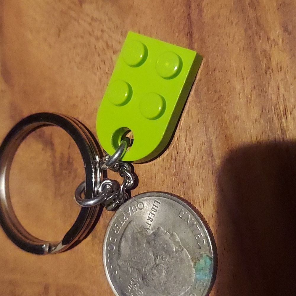 Unusual lego swag. Lime green lego block key chain.